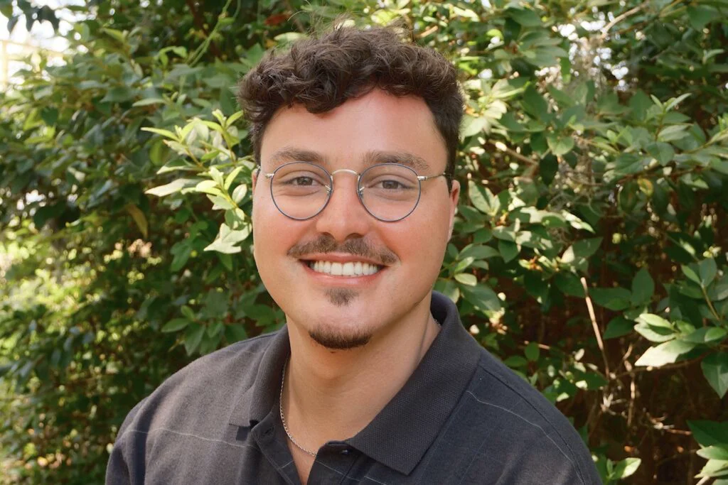 Felipe Mario Luba Aggio smiling outdoors